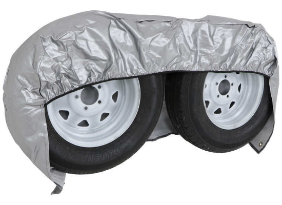 ADCO Double Axle Tire Cover Fitted Over Two RV Wheels - Angled Front View | United RV Parts