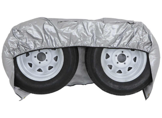 ADCO Double Axle Tyre Gard Fitted on Two RV Trailer Wheels - Side View | United RV Parts