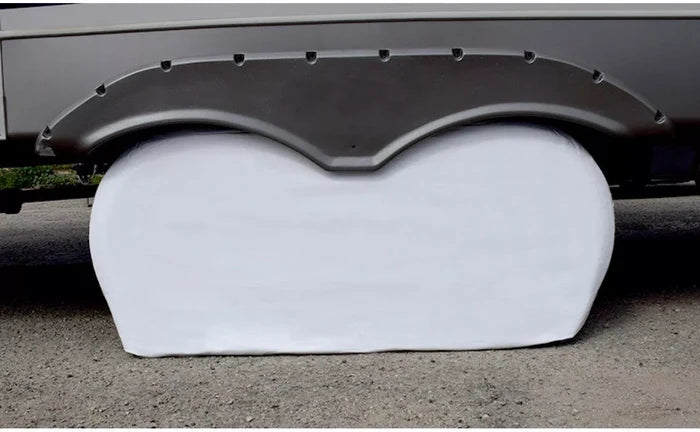 White Vinyl ADCO Double Axle Tyre Gard Installed on RV - Front View | United RV Parts