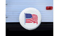 ADCO White Vinyl RV Spare Tire Cover with American Flag Design - Installed View | United RV Parts