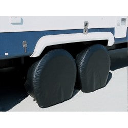 Black ADCO Ultra Tyre Gard RV Tire Covers Installed on Travel Trailer - Lifestyle Shot | United RV Parts