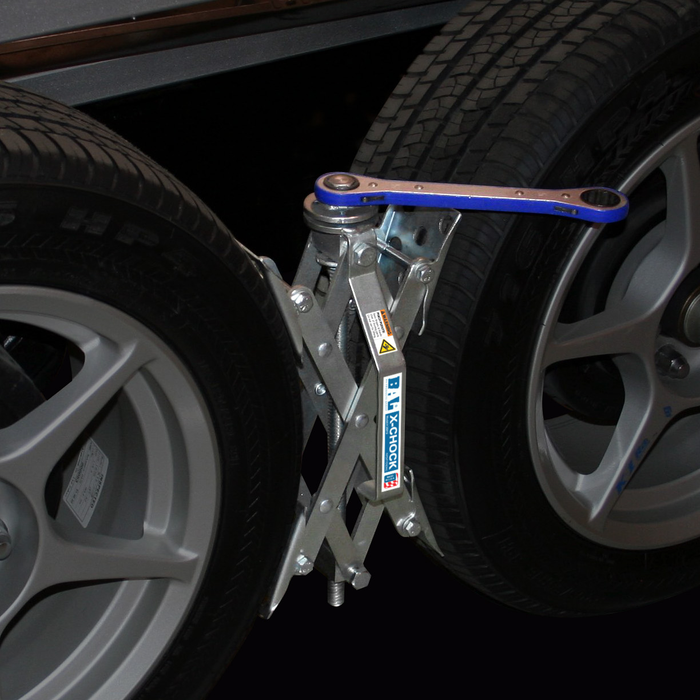 BAL X-Chock 28012 Installed Between Tandem Tires - In Use Application | United RV Parts