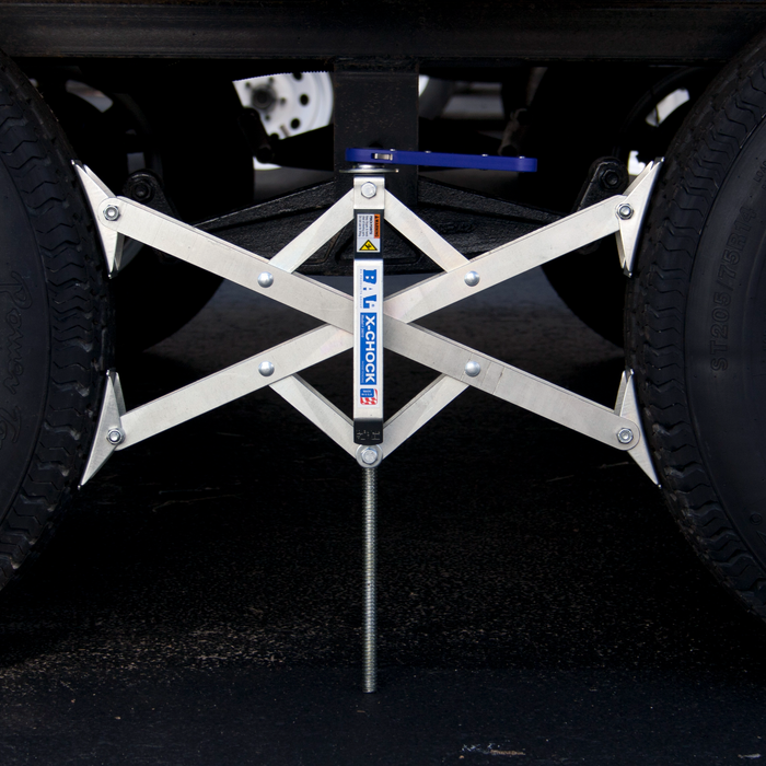 BAL X-Chock XL 28014 Installed Between RV Tires - Usage View | United RV Parts