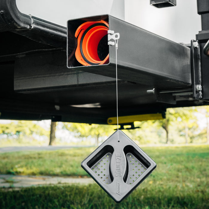 Camco Bumper Cap Hanging from RV with Saver Cable Outdoor Use | United RV Parts