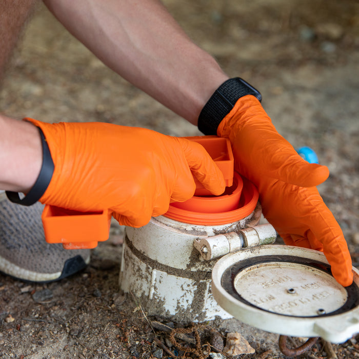 Orange Camco Sewer Wrench On RV Drain Valve - Hands-On Use | United RV Parts