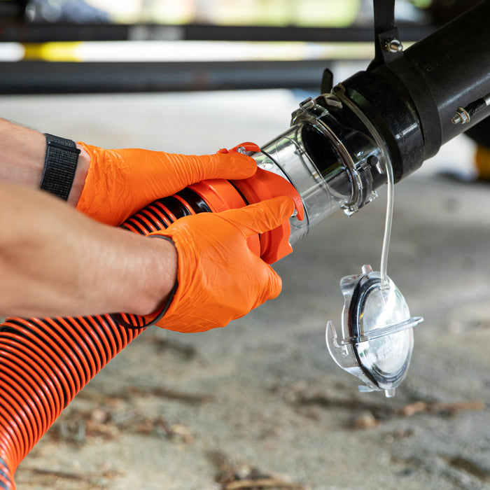 Clear RV Sewer Hose Adapter Being Connected to Orange RhinoEXTREME Fitting | United RV Parts