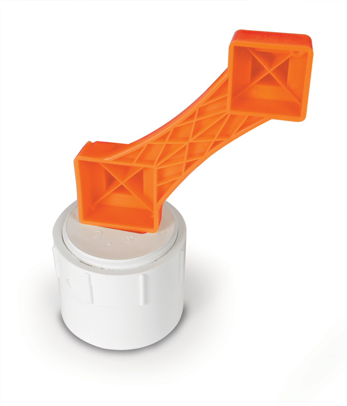 Orange Sewer Wrench on White Slotted Cleanout Plug - Use Demonstration | United RV Parts