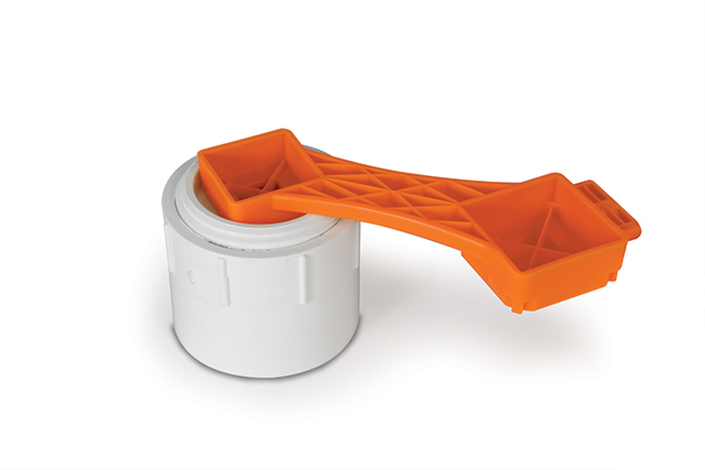 Orange RhinoFLEX Wrench on White PVC Cleanout Plug - Side Angle | United RV Parts