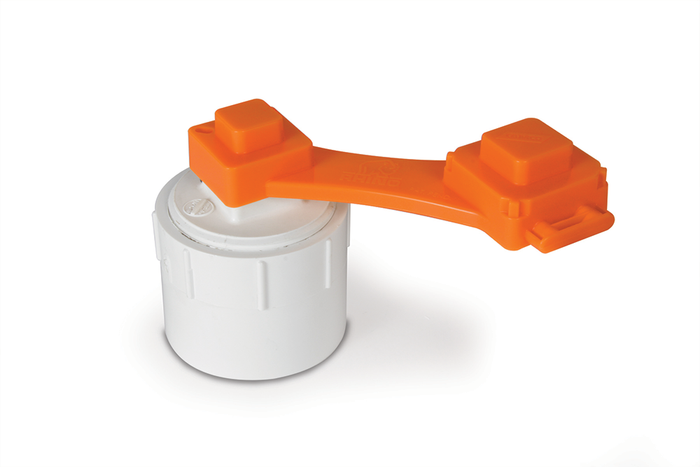 Orange Camco Sewer Wrench on White Male Cleanout Plug - Application View | United RV Parts