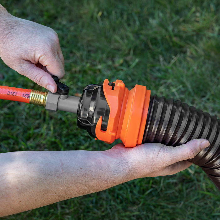 Hands Connecting Orange RhinoFLEX Clean Out Hose to Black Sewer Hose - Installation View | United RV Parts