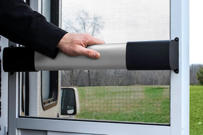 Camco RV Screen Door Cross Bar Installed - Hand Gripping Black Handle | United RV Parts