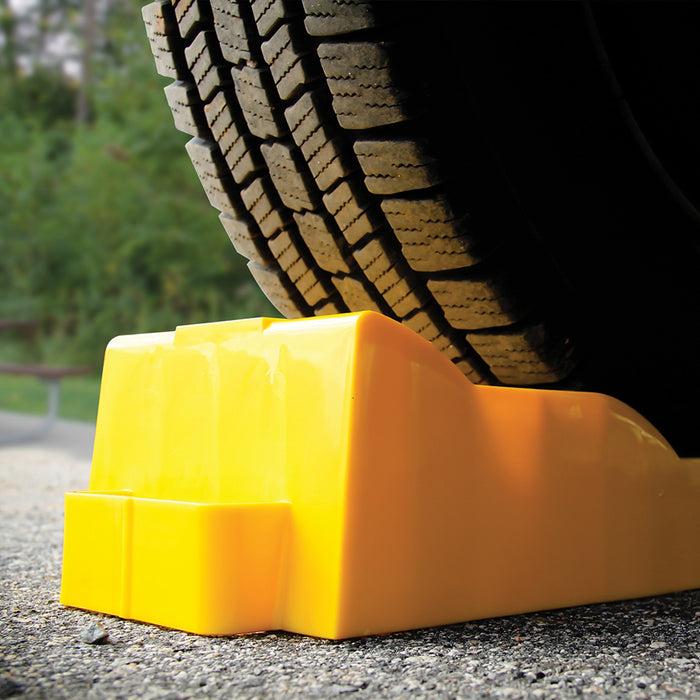 Yellow Camco Tri-Leveler Under RV Tire - In Use Application | United RV Parts