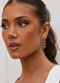 Womens Fireside Gold Earrings in the colour Gold in front of a light grey background