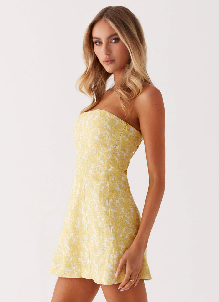Womens Livvy Strapless Mini Dress in the colour Yellow Floral in front of a light grey background