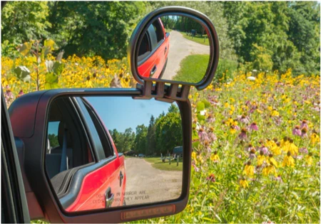 Milenco Aero Blind Spot Mirror Showing Road Reflection - In Use Lifestyle | United RV Parts