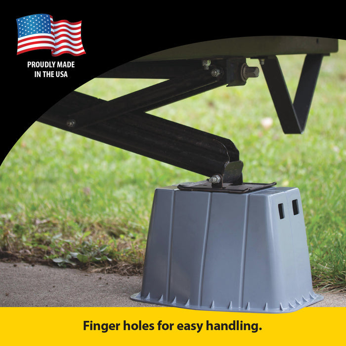 Grey RV Scissor Jack Base Pad Blocking Under Travel Trailer - In-Use Detail | United RV Parts