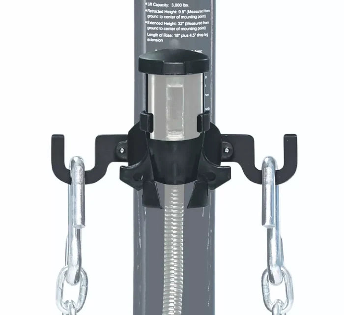 Black Stromberg Carlson JET-30 Cord Keeper mounted on tongue jack post with safety chains - Installed View | United RV Parts