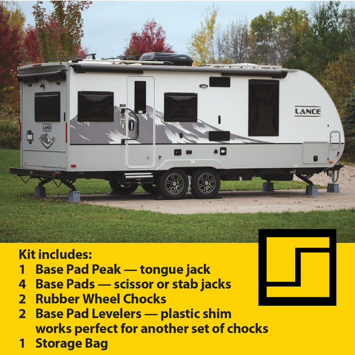 White Travel Trailer with Stabilizing Kit - Side View Campground Setup | United RV Parts
