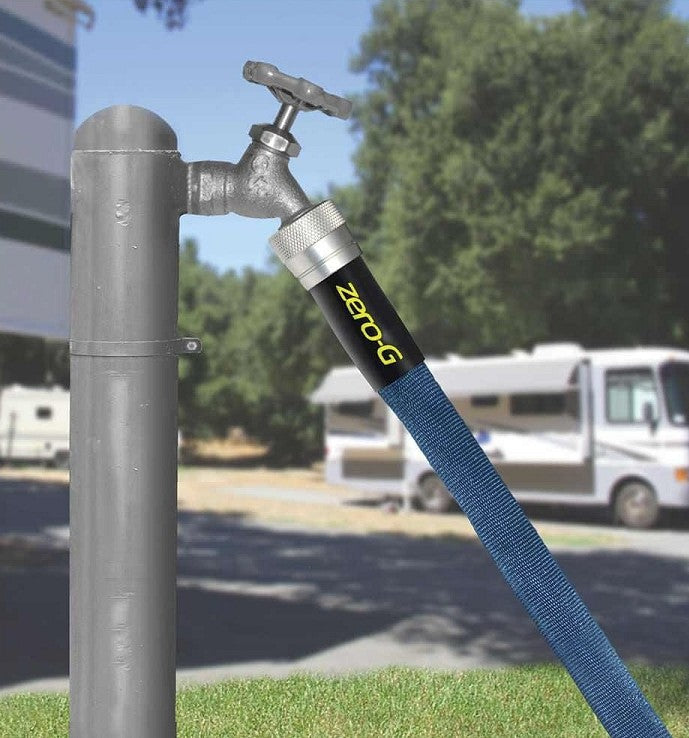 Zero-G RV Hose Connected to Water Spigot in Use - RV Campground | United RV Parts